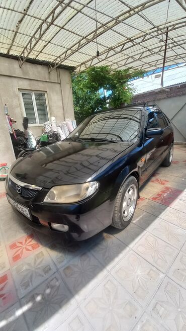 мазда деми: Mazda 323: 2001 г., 1.6 л, Механика, Бензин, Хэтчбэк