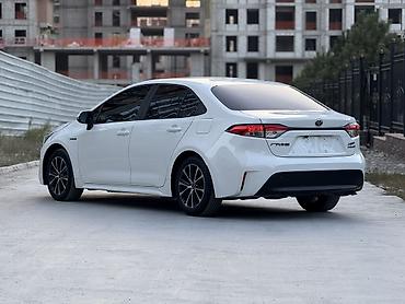 100: Toyota Corolla: 2023 г., 1.8 л, Автомат, Гибрид, Седан — 4