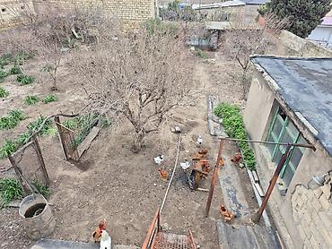 xacmaz bina: Həyətyanı torpaq sahəsi və fərdi yaşayış evi - Geniş, daş hasarla — 1