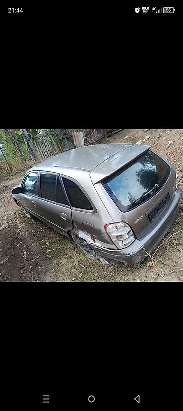 Mazda 323: 1998 г., Хэтчбэк