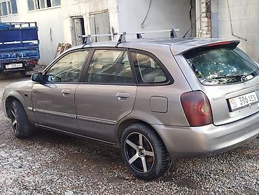 мазда унивесал: Mazda 323: 2002 г., Механика, Бензин, Универсал — 2