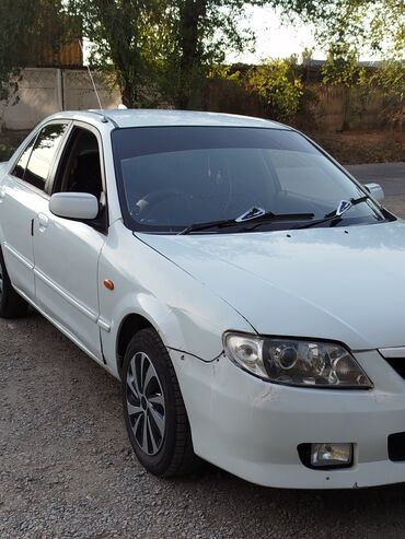 Mazda: Mazda 323: 2003 г., 1.5 л, Автомат, Бензин, Седан