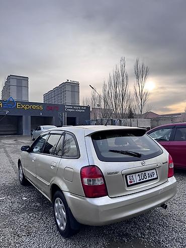 shevrolet lacetti: Mazda 323: 2002 г., 1.6 л, Автомат, Бензин, Универсал — 3