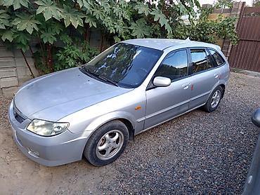 mazda premacy 1 8: Mazda Familia: 2001 г., 1.5 л, Механика, Бензин, Седан — 9