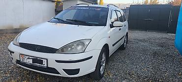 салон на авто: Ford Focus: 2004 г., 1.8 л, Механика, Дизель, Универсал — 7