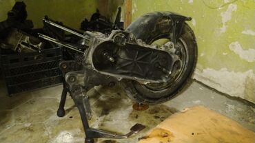 Motor üçün digər detallar: Moped üçün ehtiyat hissələri paketi Təsvir: - Arxa təkər komplekti — 1