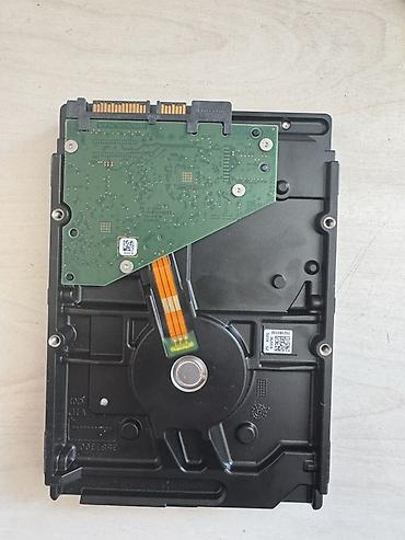 кулер цена: Жесткий диск Seagate SkyHawk 3.5" Модель: ST2000VX016 Емкость: 2 ТБ — 1