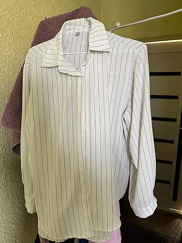 di box: Женские рубашки 
2xl
Мне велика 
А так классные рубашки — 8