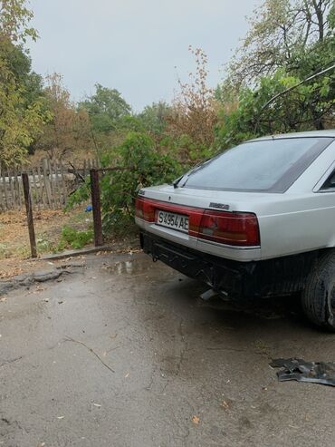 проставки на авто: Mazda 626 (серия GD), хэтчбек 5 дв., серебристый. Стеклоподъемник