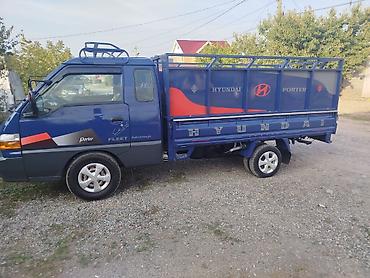 smart open: Hyundai Porter — компактный бортовой грузовик синего цвета. Основные — 2