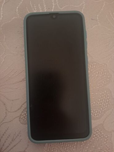Mətbəx texnikası: Samsung S5570 Galaxy Mini, rəng - Göy, Barmaq izi
