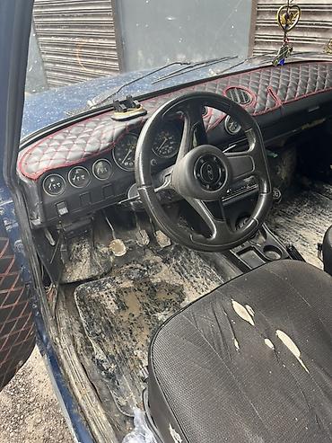 opel vectra a: VAZ 2106, mavi rəng, sedan kuzov. - Salon: qara rəngli oturacaqlar — 1