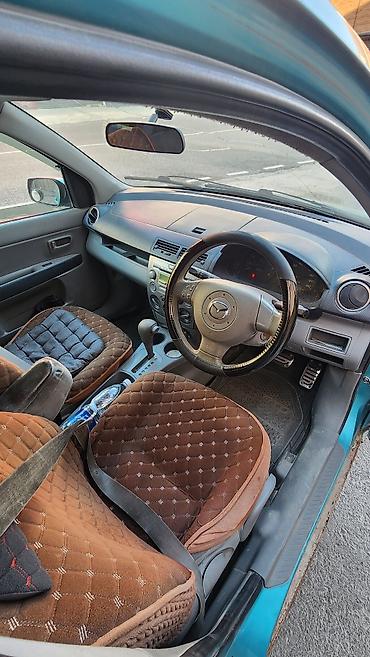 мотоботы черные: Mazda Demio: 2002 г., Автомат, Бензин, Хэтчбэк — 5