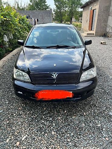 мотор на лансер: Mitsubishi Lancer: 2003 г., 1.8 л, Автомат, Бензин, Седан — 1