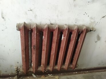 услуги по замене радиаторов отопления: Радиатор чугунный
