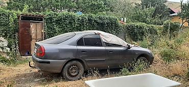 passat variant: Седан среднего класса, темно‑серый, 4 двери. Компактные габариты — 3