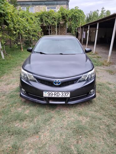 lexus is: Toyota Camry: 2.5 l | 2014 il Sedan
