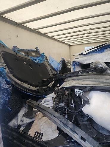Бампер и комплектующие: Бампер Kia, Оригинал — 21
