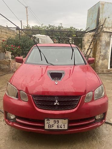inci 75 amper aku: Mitsubishi Lancer: 2 l | 2002 il 287332 km Universal — 1