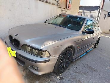 opel vectra b: BMW 5 series: 2.8 l | 1997 il Sedan — 4