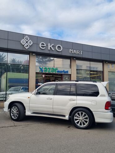 Toyota: Toyota Land Cruiser 2002 – baxımlı, əziyyət görməyib. Ağ rəngdədir — 24
