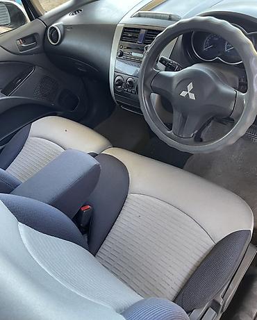 митсубиси хэтчбек: Mitsubishi Colt: 2003 г., 1.3 л, Автомат, Бензин, Хэтчбэк — 6