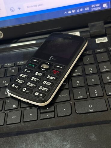 телефон fly iq4401: Fly Ezzy, 16 ГБ, цвет - Черный, Гарантия, Кнопочный, Две SIM карты