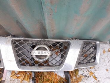 капот нексия 1: Решетка радиатора Nissan Оригинал