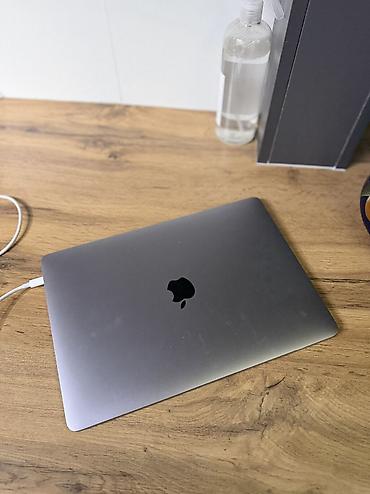 тонкий: Apple MacBook Pro 15.7.7серия с Touch Bar), цвет Space Gray Основные — 3