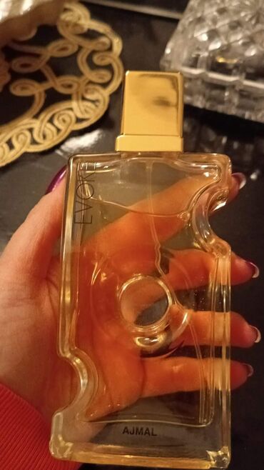 tikişsiz qadın leqqinsləri: Арабский парфюм из ОАЭ Evoke Ajmal — это аромат для женщин, он