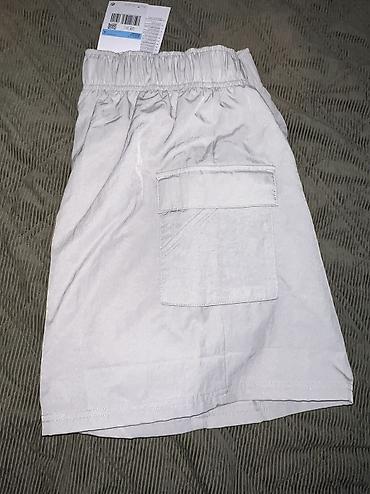 aksa: Nike Sportswear Essential Women's Woven High-Waisted Shorts vel. M — 6