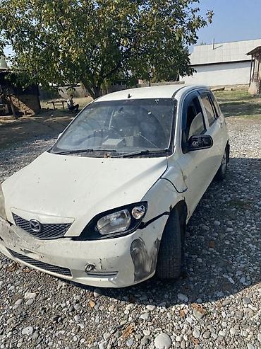 электр авто: Mazda Demio: 2003 г., 1.3 л, Автомат, Бензин, Хетчбек — 9