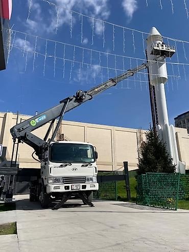 Аренда транспорта: Аренда автовышки на шасси Hyundai с телескопической стрелой и большой — 1