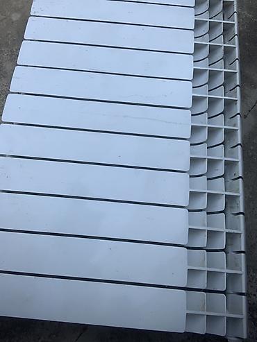 radiyatr: Ağ rəngli sektsiyalı radiator (isitmə batareyası) - Material — 1