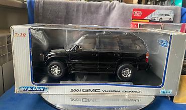 Avtomobil modelləri: Коллекционная модель GMC Yukon Denali black 2001 Welly Art  — 1