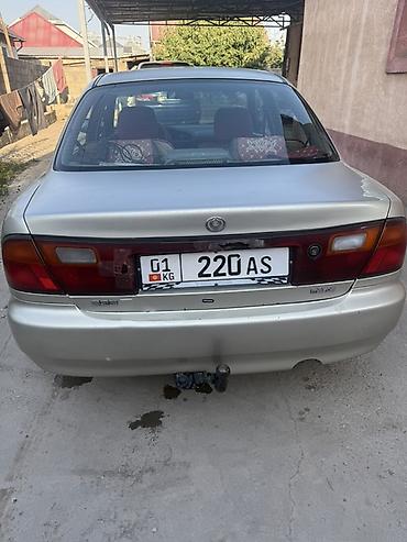 hozon neta l: Mazda 323: 1996 г., 1.5 л, Автомат, Бензин, Седан — 3