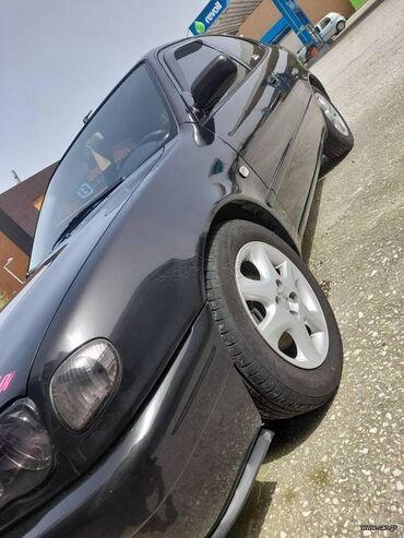 Toyota: Toyota Corolla: 1.4 l. | 2002 έ. Χάτσμπακ — 14