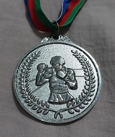 İdman kubokları və medalları: Boks medal dəsti - Rənglər: qızıl, gümüş, bürünc - Dizayn: Hər iki — 18