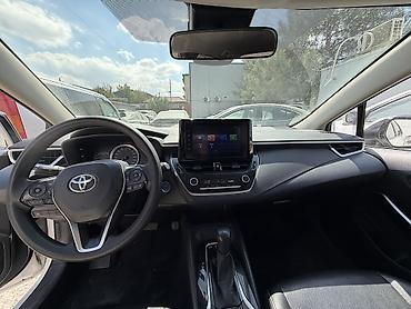 byd e6: Toyota Corolla: 2022 г., 1.8 л, Вариатор, Гибрид, Седан — 5