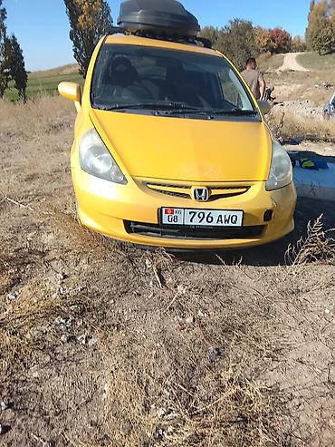 авто накитки: Honda Fit: 2004 г., Бензин, Хэтчбэк — 1