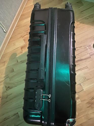 Sərt korpuslu təkərli çamadan 22sm x 45sm x65 sm - Rəng: qara -