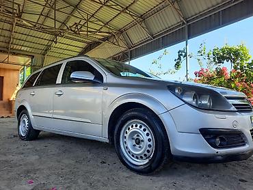 фольксваген тигуан л с: Opel Astra 1.3 turbo dizel (universal) – gümüşü rəngdə, 5 qapılı — 2