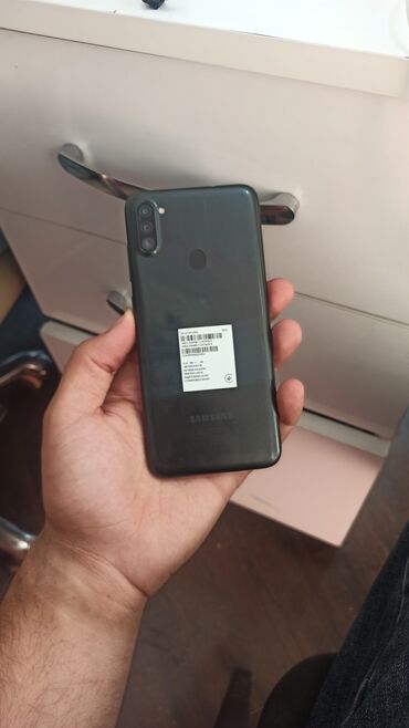 samsung p310: Samsung Galaxy A11, 32 GB, rəng - Qara, Düyməli, Barmaq izi, İki sim kartlı