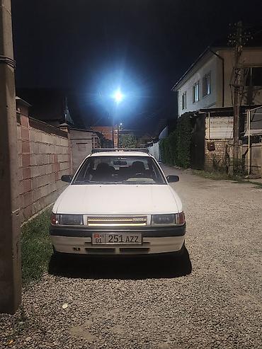 Mazda: Mazda 323: 1989 г., 1.6 л, Механика, Бензин, Седан — 2