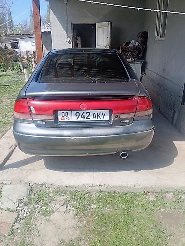 zero x neo: Mazda Cronos: 1993 г., 2 л, Механика, Бензин, Хэтчбэк — 2