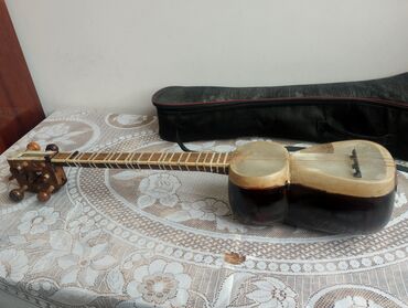 Кабели: Tar musiqi aləti - 6 simli, uzun qollu Azərbaycan tarı - İkihissəli
