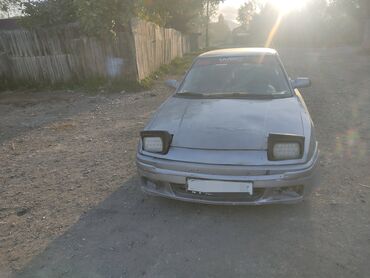 кузовной домкрат: Mazda 323 F (BA) хэтчбек, праворульная версия с выдвижными фарами