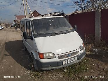 кемперы: Ford Transit пассажирский микроавтобус (белый, длинная база, 4 двери — 1