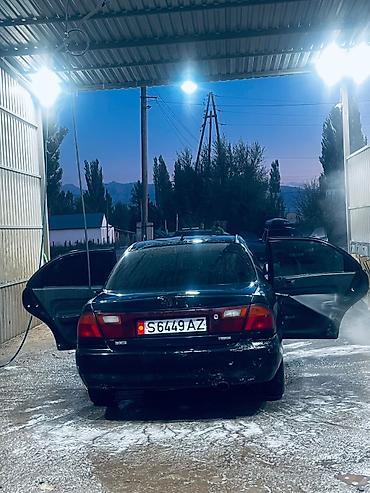 mazda 326: Mazda 323: 1995 г., 1.6 л, Автомат, Бензин, Седан — 5