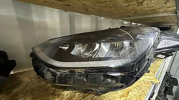 Системы освещения: Передняя фара в сборе для автомобиля Ford (левая сторона) — 1